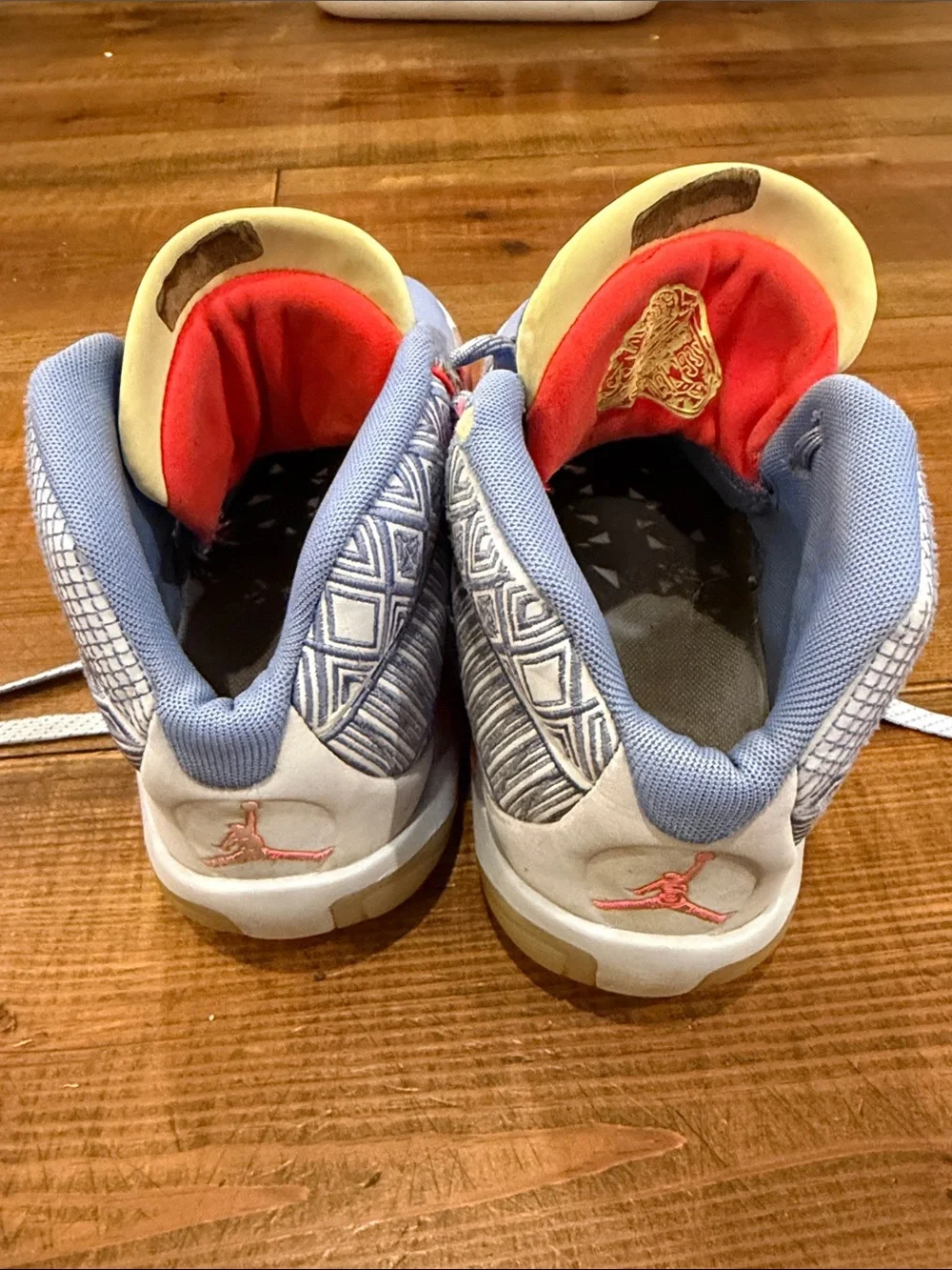 Jordan Kids Pastel Blue High-Top Sneakers with Coral Accents